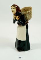 A Coll pottery figure of a women, Isle of Lewis, 19cm tall