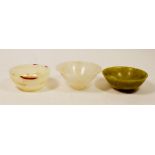 Two Chinese agate tea cups and a jade one