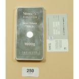A Stones 1kg silver bullion bar with certificate