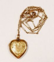 A 9 carat gold front and back heart form locket on yellow metal chain