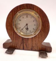 A Smiths car dashboard clock with eight day movement fitted into wooden case, 18cm tall