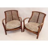 A pair of 19th century cane back low nursing chairs