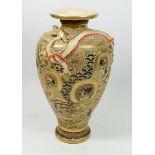 A Meiji period Satsuma vase painted Samuri warriors and dragon, 31cm tall