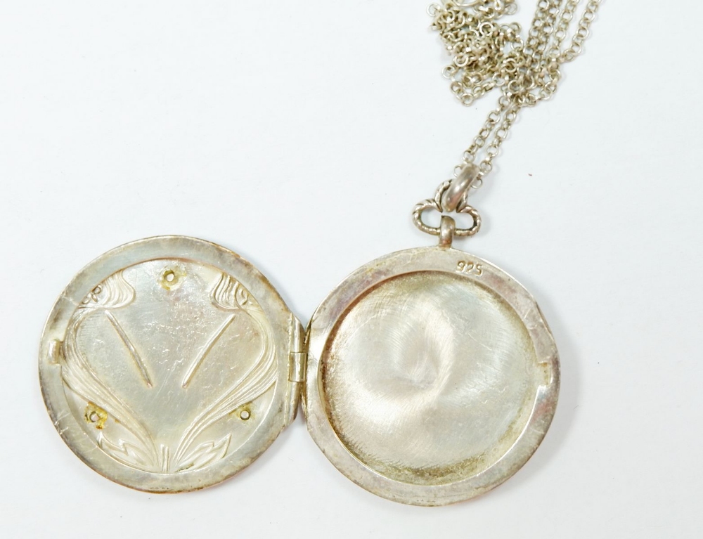 An Art Nouveau silver circular circular locket with enamel iris decoration, marked AM Ltd, on silver - Image 4 of 4