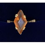 A 9 carat gold ring set lozenge form topaz, size M