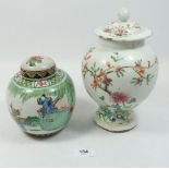 A 19th century Chinese famille verte ginger jar and cover painted man on a roof climbing into a