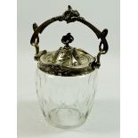 A 19th century cut glass biscuit jar with silver plated Art Nouveau lid and handle