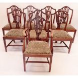 A reproduction mahogany set of eight Hepplewhite shield back dining chairs including two carvers
