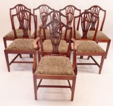 A reproduction mahogany set of eight Hepplewhite shield back dining chairs including two carvers