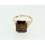A 9 carat gold smokey quartz ring, size N, 4.4g