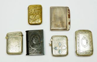 Six various vesta cases including one brass Art Nouveau example and one with white agate inlay