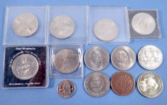 A collection of ten Elizabeth II crowns, a Natwest world savers Jaguar 1989 coin, a Sainsbury's