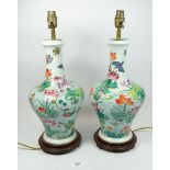 A pair of Chinese table lamps painted ducks and waterlilies, 47cm tall