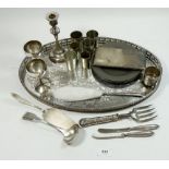 A tray of silver plate and pewter items plus a silver candlestick