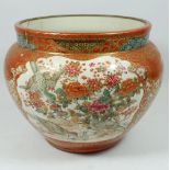 A Japanese Kutani jardiniere painted reserves of figures, birds and flowers, damaged, signed to
