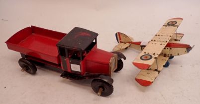 A painted metal toy truck, 49cm and a painted model metal aeroplane, 47cm wingspan