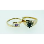 A 9 carat crossover ring set amethyst and white stones, size H and a 9 carat gold sapphire cluster