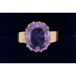 A 9 carat gold oval cut amethyst ring, size O to P
