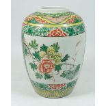 A late Qing dynasty famille verte vase painted floral reserves, 22cm