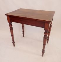 A Victorian mahogany side table on turned supports