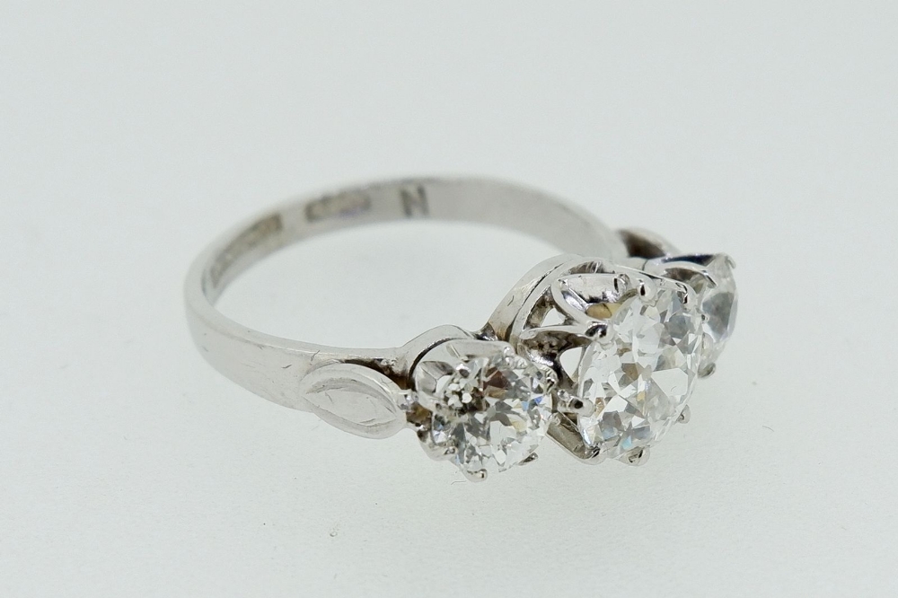 A fine quality platinum set three stone diamond ring, 2.5 cts in total, size M - Image 8 of 9