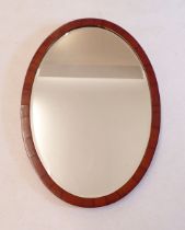 An Edwardian oval mahogany framed mirror 50x71cm