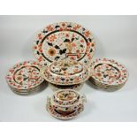 A Victorian Ashworth's Ironstone part dinner service decorated flowers in iron red, black, gilt