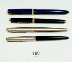 Four Parker fountain pens