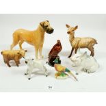 A group of seven Beswick animal figures including Great Dane 'Ruler of Ouborough', deer, calf,