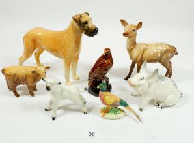 A group of seven Beswick animal figures including Great Dane 'Ruler of Ouborough', deer, calf,