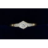 An Edwardian 18 carat gold ring set diamonds, size N