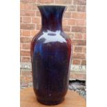 A Chinese Qing dynasty large flambe glaze purple and red streaked vase, 57cm tall, repaired to neck
