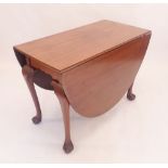 A mahogany oval dropleaf dining table on cabriole supports and claw and ball feet, 170 x 106cm x