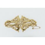 An Ola Gorie Celtic 9 carat gold openwork dragon brooch, 11g