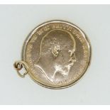 A gold sovereign Edward VII 1910 in 9 carat gold mount