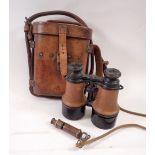 A pair of Derby & Forestier, Paris WWI binoculars, cased and a 1915 whistle