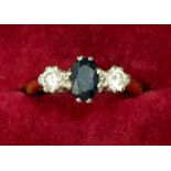 An 18 carat gold sapphire and diamond ring, size O, 4.1g