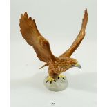 A Beswick Golden Eagle, 25cm tall