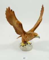 A Beswick Golden Eagle, 25cm tall