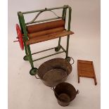 An early 20th century child's Triang mangle with tin washtub, 49 x 38cm