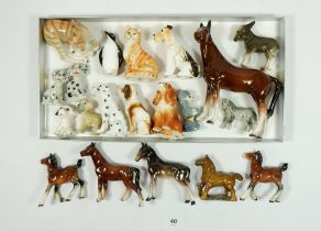 A collection of animal ornaments including Wade & USSR zebra