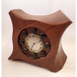 A 19th century clock movement mounted in cut down aeroplane propellor 'Wolseley' 28cm tall