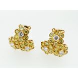 A pair of 18 carat gold triple flower form earrings set yellow and white diamonds, unmarked, 1.5 x