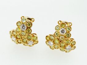 A pair of 18 carat gold triple flower form earrings set yellow and white diamonds, unmarked, 1.5 x