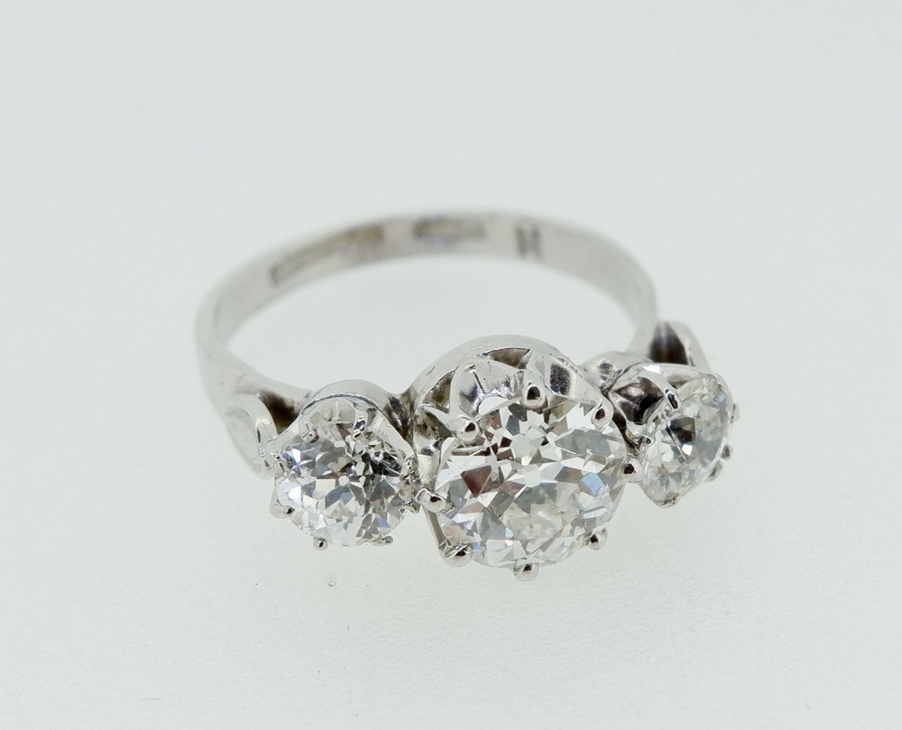 A fine quality platinum set three stone diamond ring, 2.5 cts in total, size M - Image 9 of 9