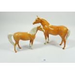 Two Beswick Palamino standing horses