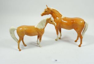 Two Beswick Palamino standing horses