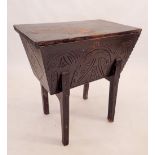 A 17th century style ebonised dough bin with carved decoration, 71 x 47cm