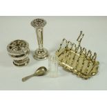 A collection of silver plated items to include a toast rack, rose bowl, posy holder and caddy spoon
