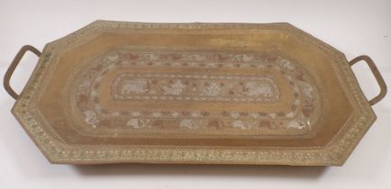 A Celonese brass inlaid tray with engraved and chased decoration, 64 x 35cm